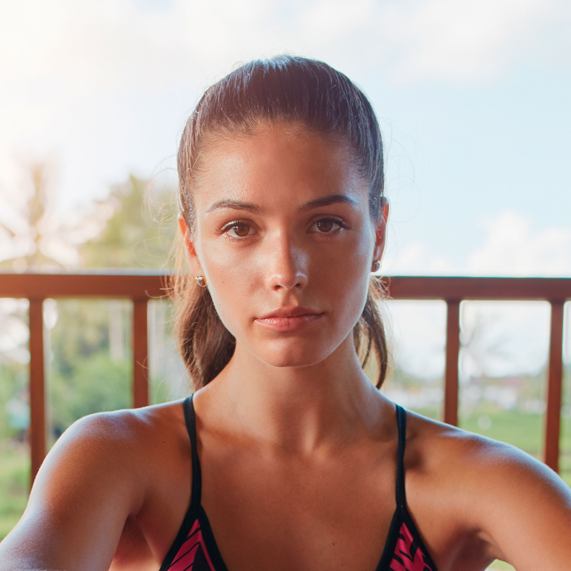 young-woman-relaxing-on-yoga-mat-P7E9W9U.jpg
